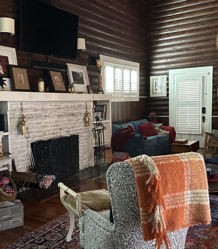 Photo of the Living Room and Doorway Leading to the Pool Room